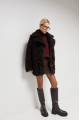 Curly double-sided chocolate-colored sheepskin coat made of natural sheepskin